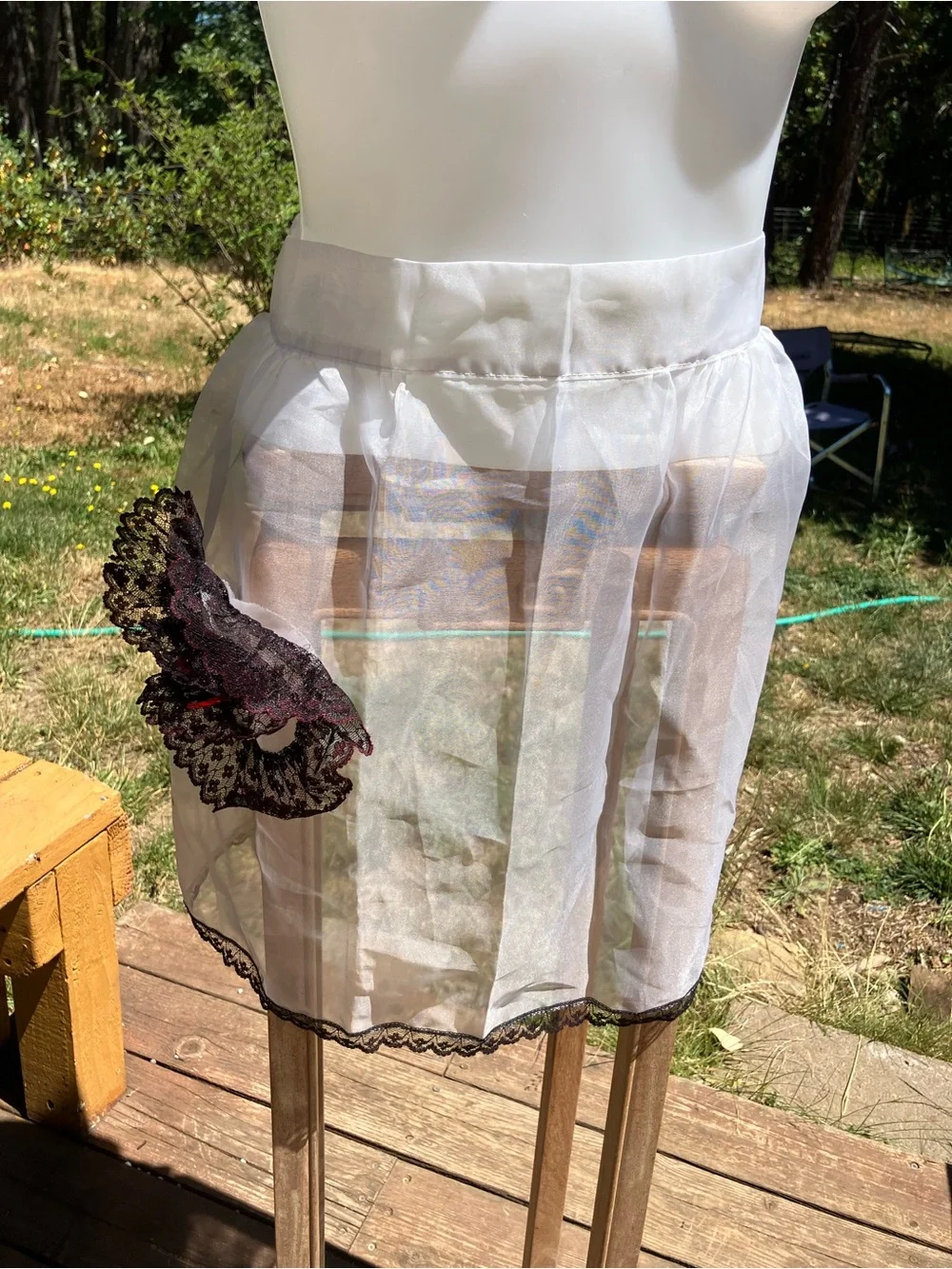 Vintage sheer apron with black and red lace pocket